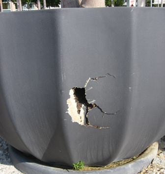 damaged fiberglass planter